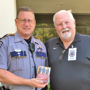 Books delivered following killing of three law officers