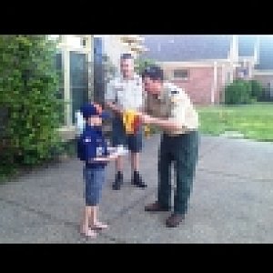 Cub Scout recovering from surgery advances in rank