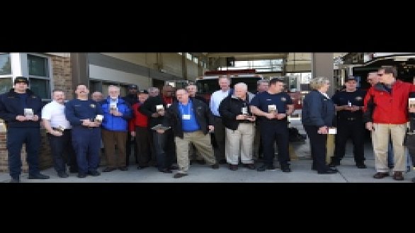 news um men give devotional books to firefighters 0