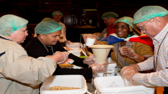 news world methodist conference participants package more than 100000 meals for children 0